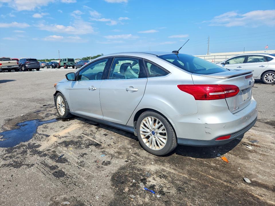 Снимка 2 от търг – 2018 FORD FOCUS с VIN 1FADP3J24JL201694