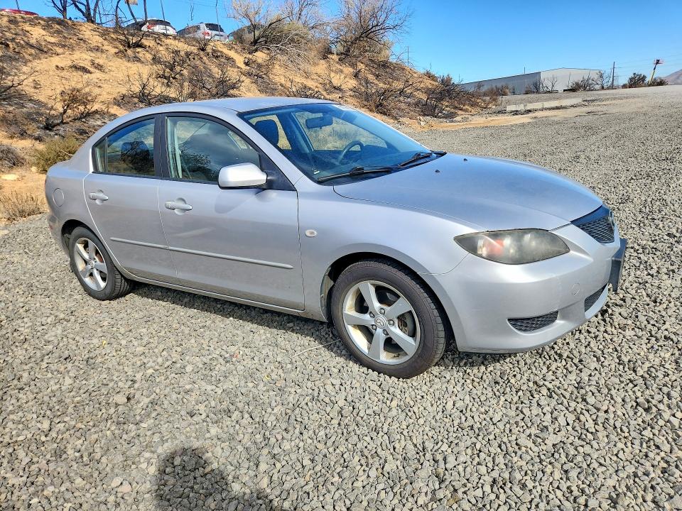 Снимка 4 от търг – 2006 MAZDA 3 с VIN JM1BK12F261423966