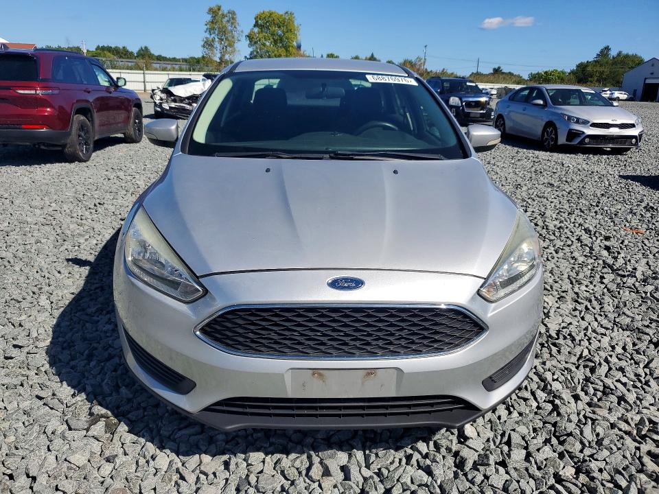 Foto 5 de la subasta – 2016 FORD FOCUS con VIN 1FADP3F20GL335913