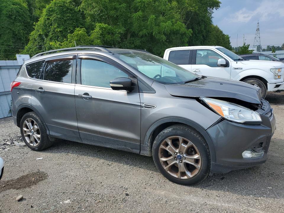 Photo 4 from auction – 2013 FORD ESCAPE with VIN 1FMCU0H91DUA31921