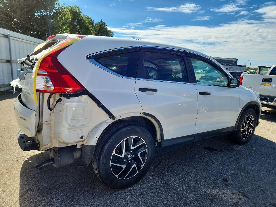 Photo 3 from auction – 2016 HONDA CR-V with VIN 5J6RM4H40GL020083