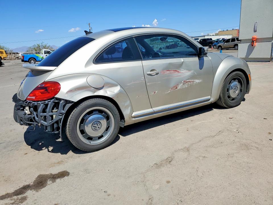 Photo 3 from auction – 2013 VOLKSWAGEN BEETLE with VIN 3VWJP7AT8DM617695