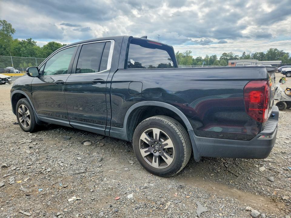 Photo 2 from auction – 2017 HONDA RIDGELINE with VIN 5FPYK3F52HB008655
