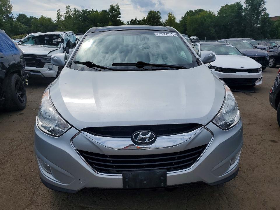 Photo 5 from auction – 2010 HYUNDAI TUCSON with VIN KM8JUCAC3AU024883
