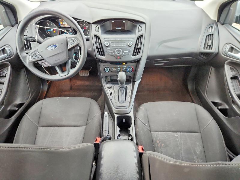 Снимка 8 от търг – 2018 FORD FOCUS с VIN 1FADP3F20JL252599