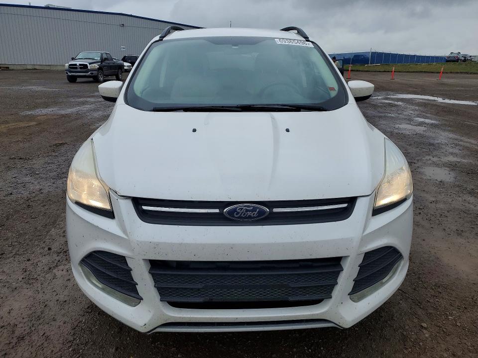 Photo 5 from auction – 2015 FORD ESCAPE with VIN 1FMCU9G9XFUC38350