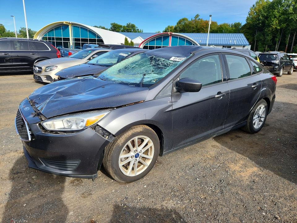 FORD FOCUS 2018 with VIN 1FADP3F29JL290865 - Photo from auction