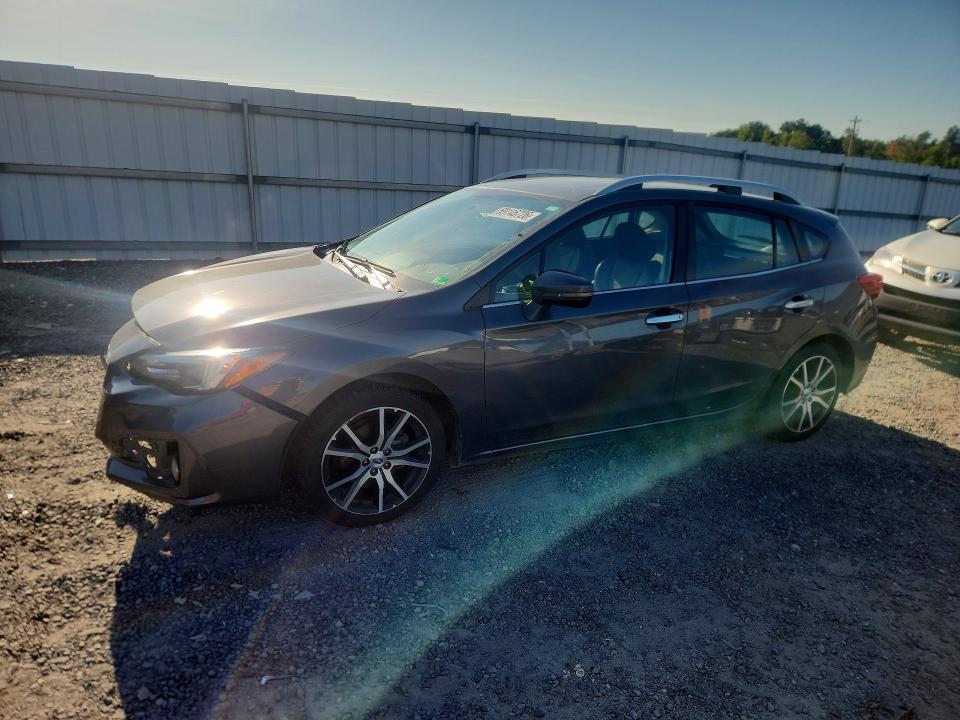 SUBARU IMPREZA 2019 with VIN 4S3GTAU69K3710834 - Photo from auction