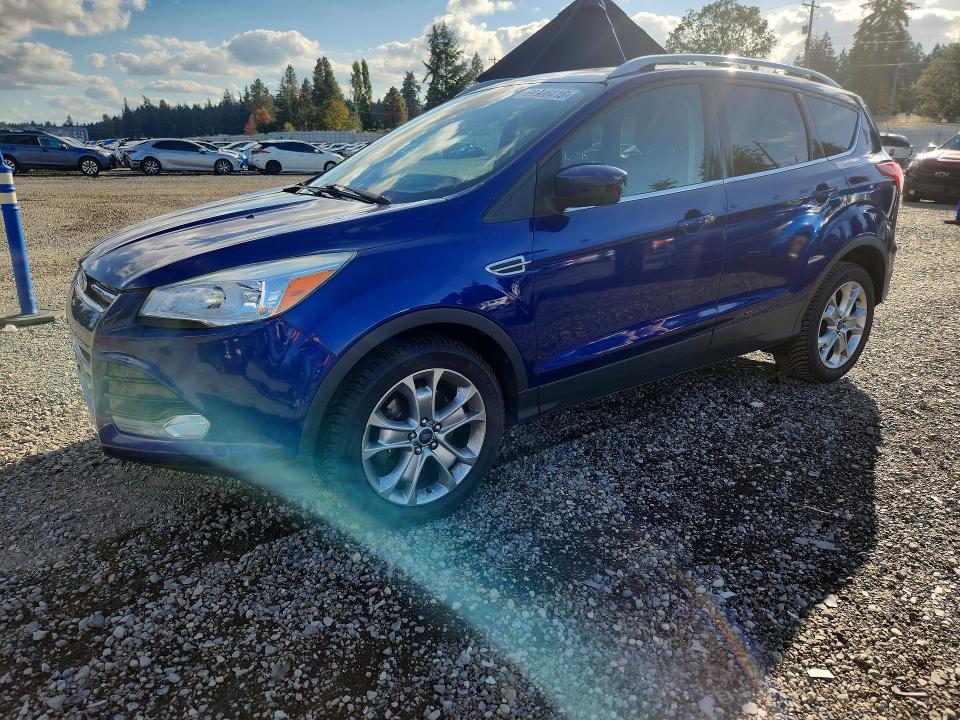 FORD ESCAPE 2014 with VIN 1FMCU9JX8EUD47668 - Photo from auction