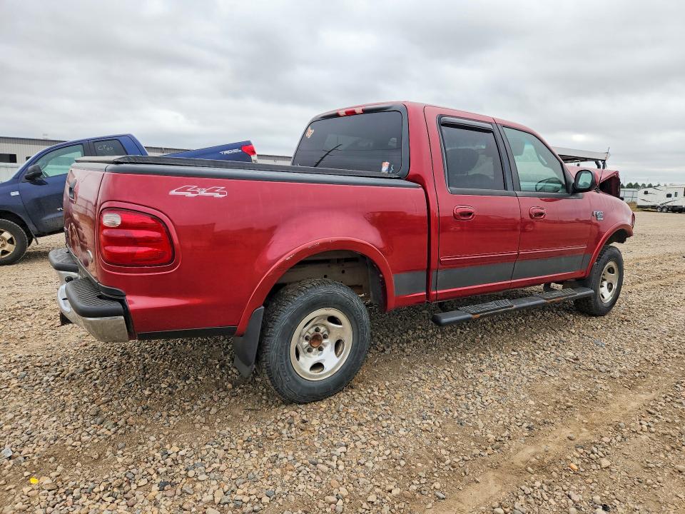Снимка 3 от търг – 2001 FORD F150 с VIN 1FTRW08L61KF51513