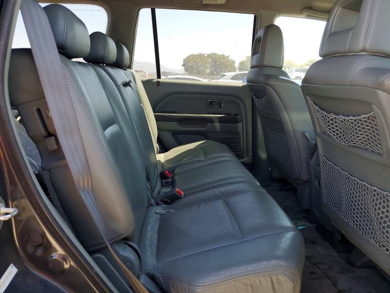 Фото 11 с аукциона – 2004 HONDA PILOT с VIN 2HKYF18534H571577