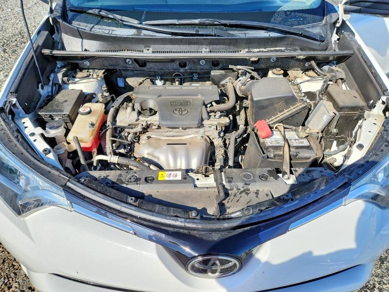 Photo 12 from auction – 2017 TOYOTA RAV4 with VIN JTMZFREVXHJ123552