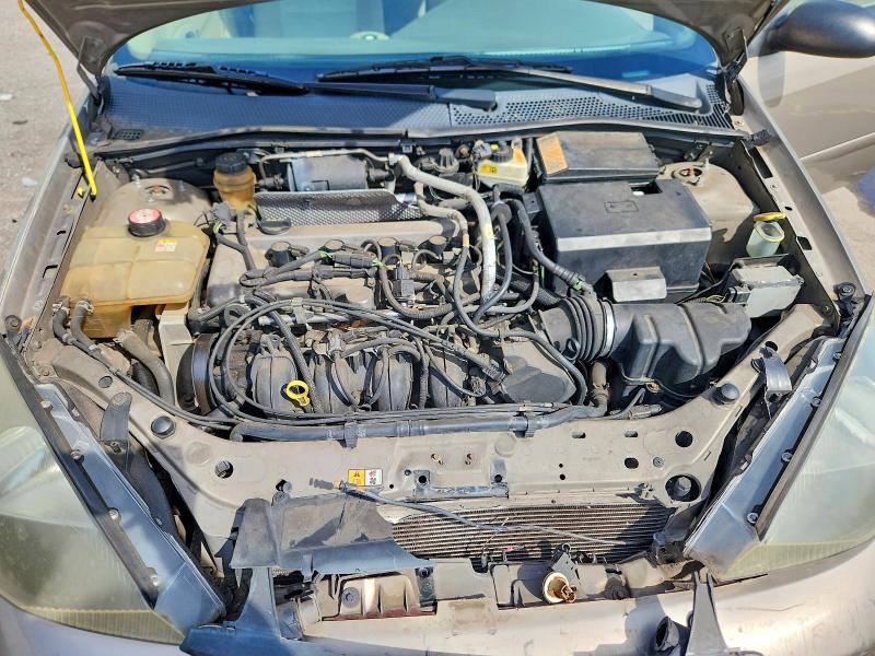 Zdjęcie 11 z aukcji – 2004 FORD FOCUS z VIN 1FAFP38Z54W153802