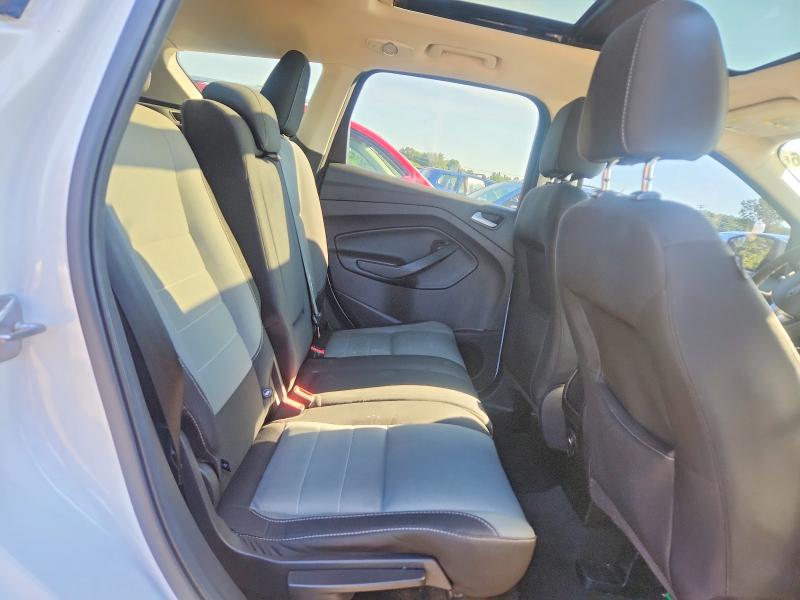 Фото 11 с аукциона – 2016 FORD ESCAPE с VIN 1FMCU0G9XGUB25057