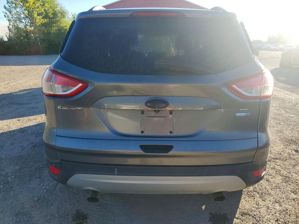 Снимка 6 от търг – 2014 FORD ESCAPE с VIN 1FMCU9GX3EUD74249