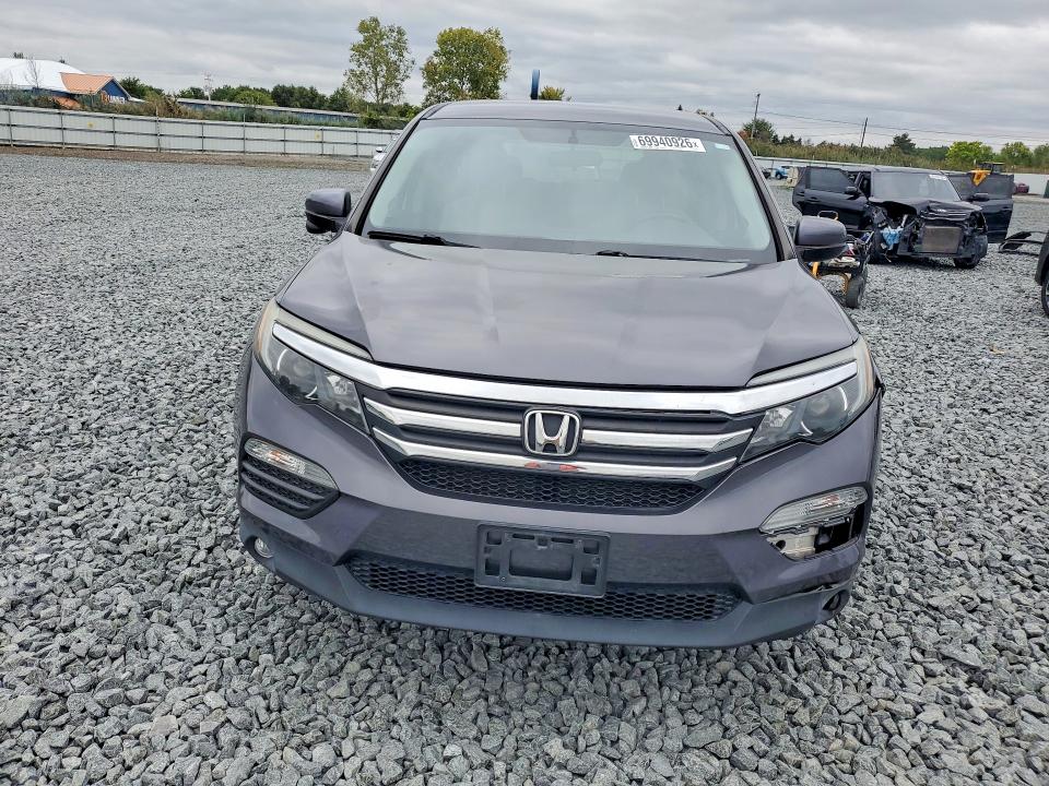 Photo 5 from auction – 2018 HONDA PILOT with VIN 5FNYF6H30JB071558