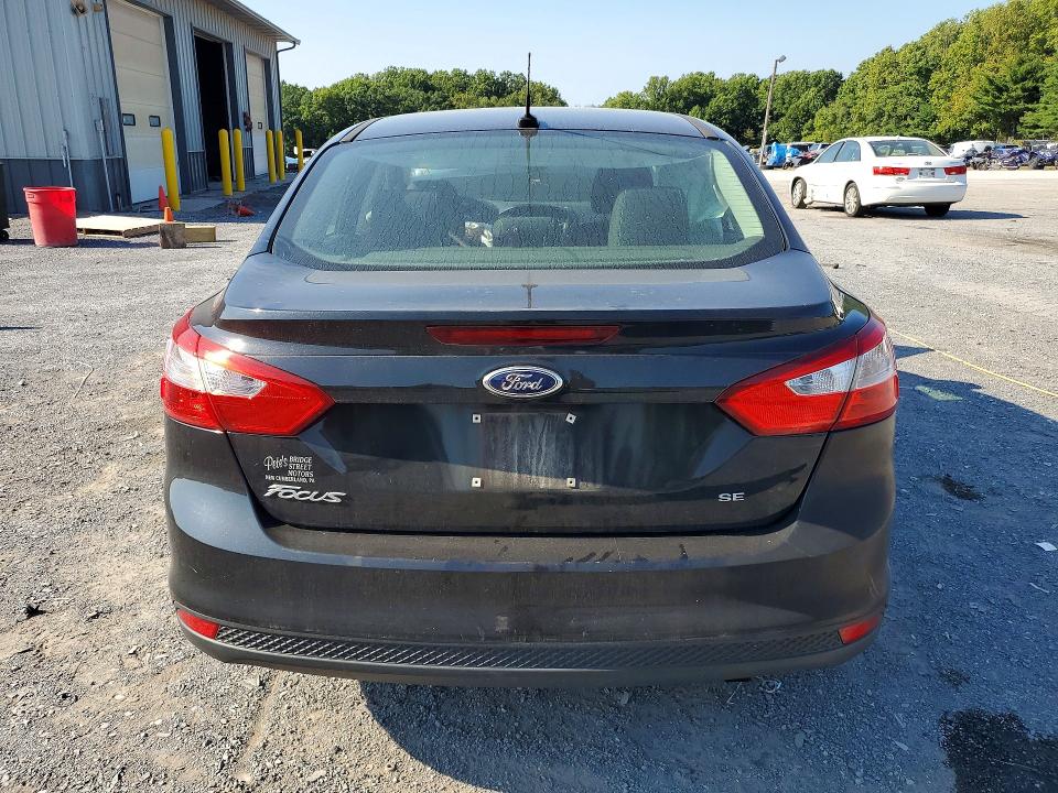 Снимка 6 от търг – 2014 FORD FOCUS с VIN 1FADP3F21EL425133
