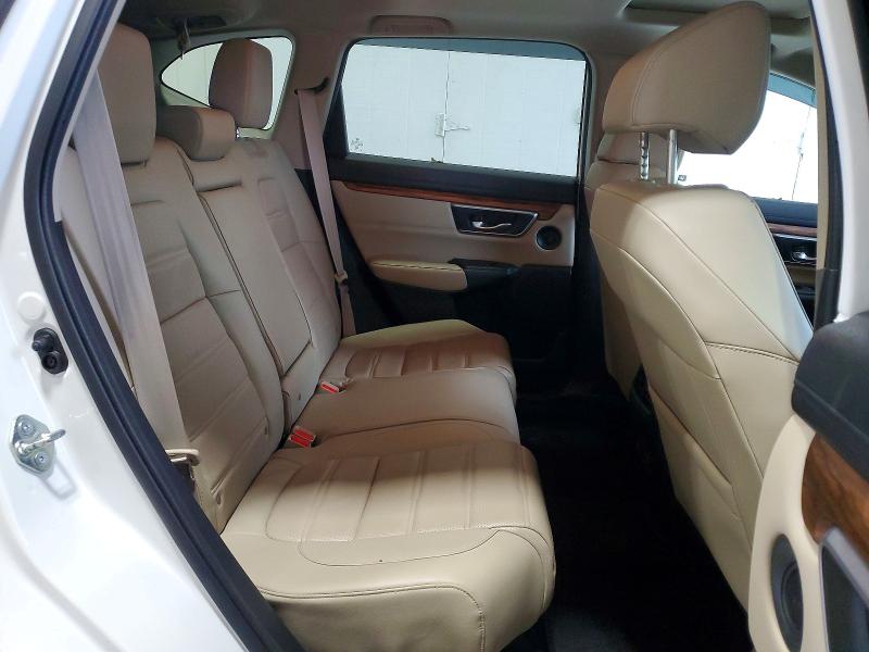 Photo 11 from auction – 2018 HONDA CR-V with VIN 2HKRW2H83JH602911