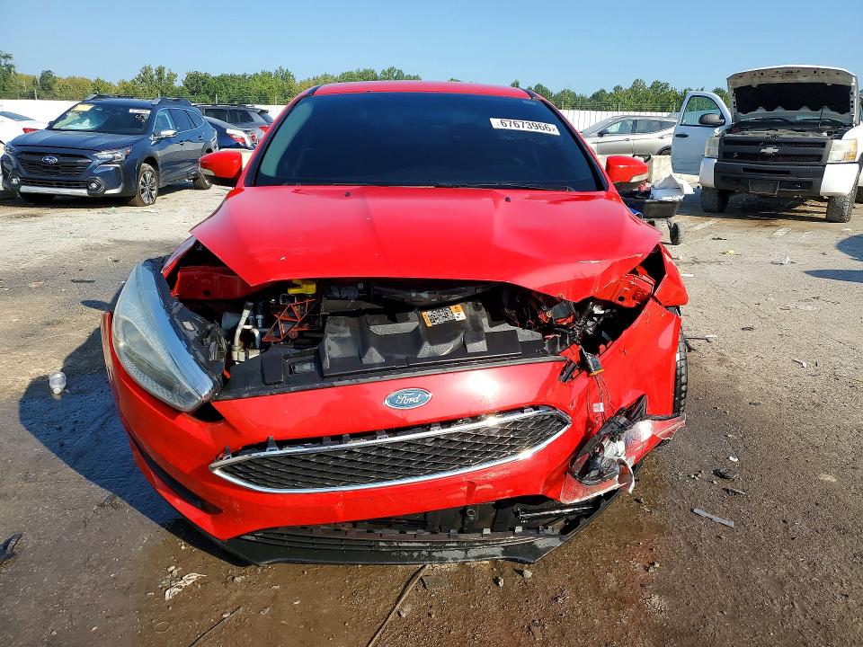 Photo 5 from auction – 2016 FORD FOCUS with VIN 1FADP3F20GL201886