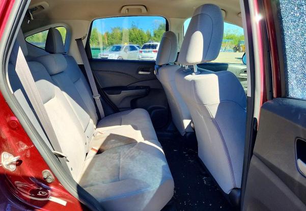 Photo 11 from auction – 2015 HONDA CR-V with VIN 5J6RM4H30FL087045