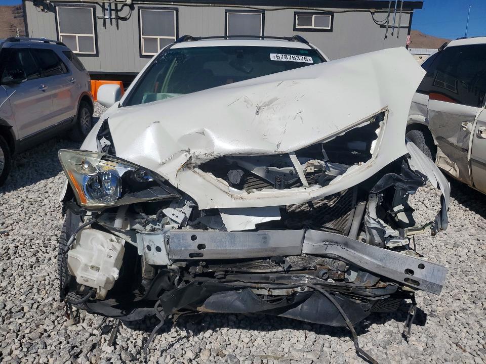 Снимка 5 от търг – 2009 LEXUS RX с VIN 2T2GK31U09C080605