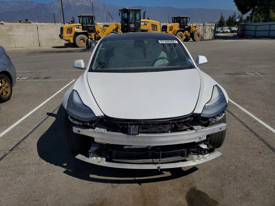 Photo 5 from auction – 2020 TESLA MODEL 3 with VIN 5YJ3E1EA2LF599009