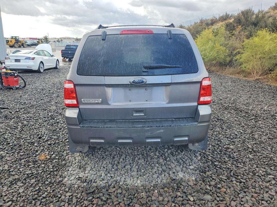 Снимка 6 от търг – 2010 FORD ESCAPE с VIN 1FMCU9D71AKC28474