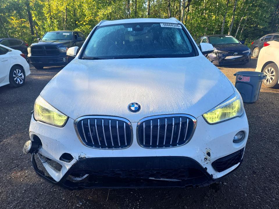 Photo 5 from auction – 2019 BMW X1 with VIN WBXHT3C50K5N76862
