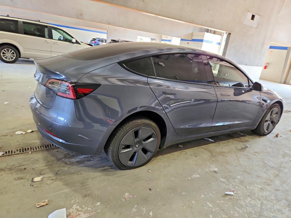 Снимка 3 от търг – 2023 TESLA MODEL 3 с VIN 5YJ3E1EA7PF570496