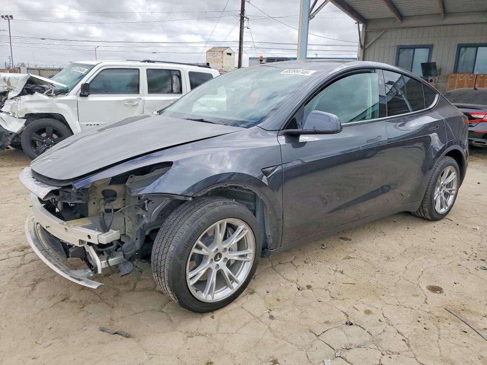 TESLA MODEL Y 2024 with VIN 7SAYGDEDXRF046034 - Photo from auction