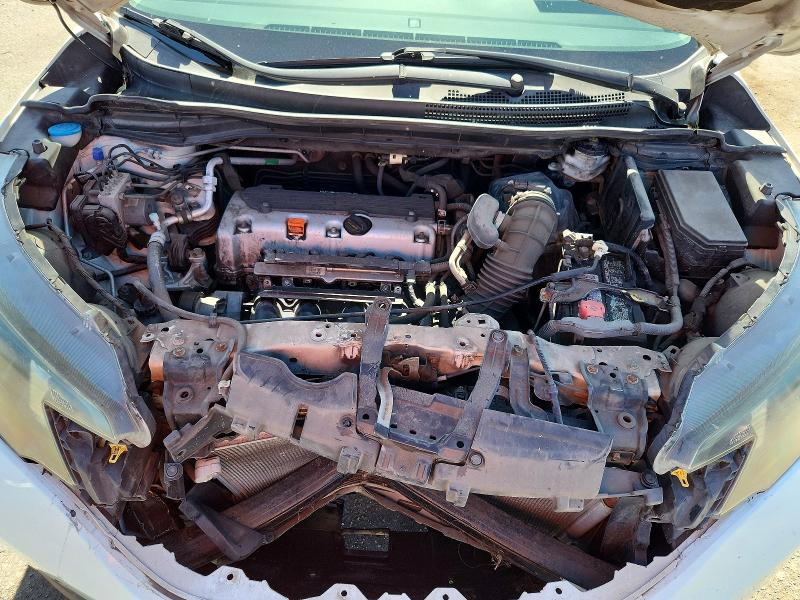 Photo 11 from auction – 2014 HONDA CR-V with VIN 5J6RM3H31EL040809