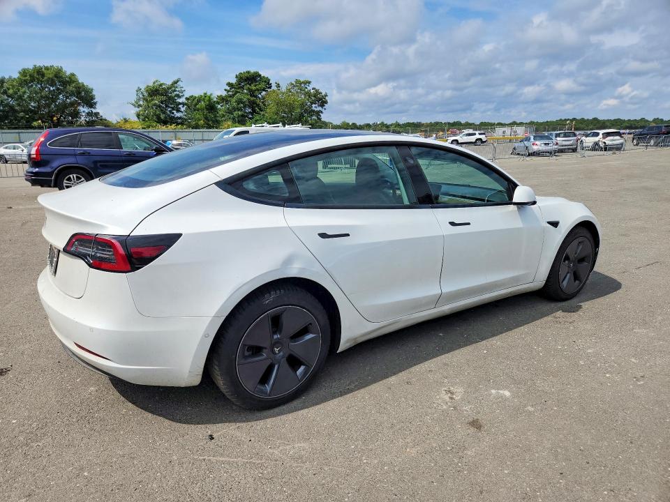 Photo 3 from auction – 2021 TESLA MODEL 3 with VIN 5YJ3E1EA0MF851972