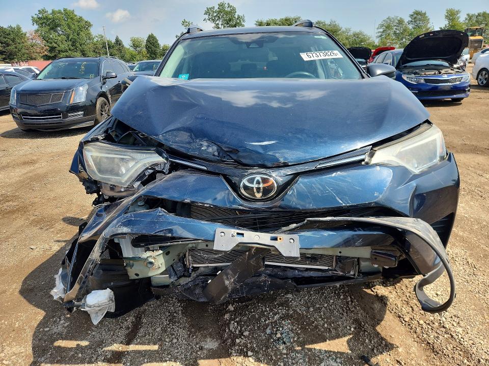 Zdjęcie 5 z aukcji – 2018 TOYOTA RAV4 z VIN 2T3BFREVXJW829557