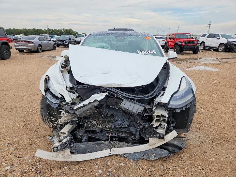 Снимка 5 от търг – 2022 TESLA MODEL 3 с VIN 5YJ3E1EB0NF144199