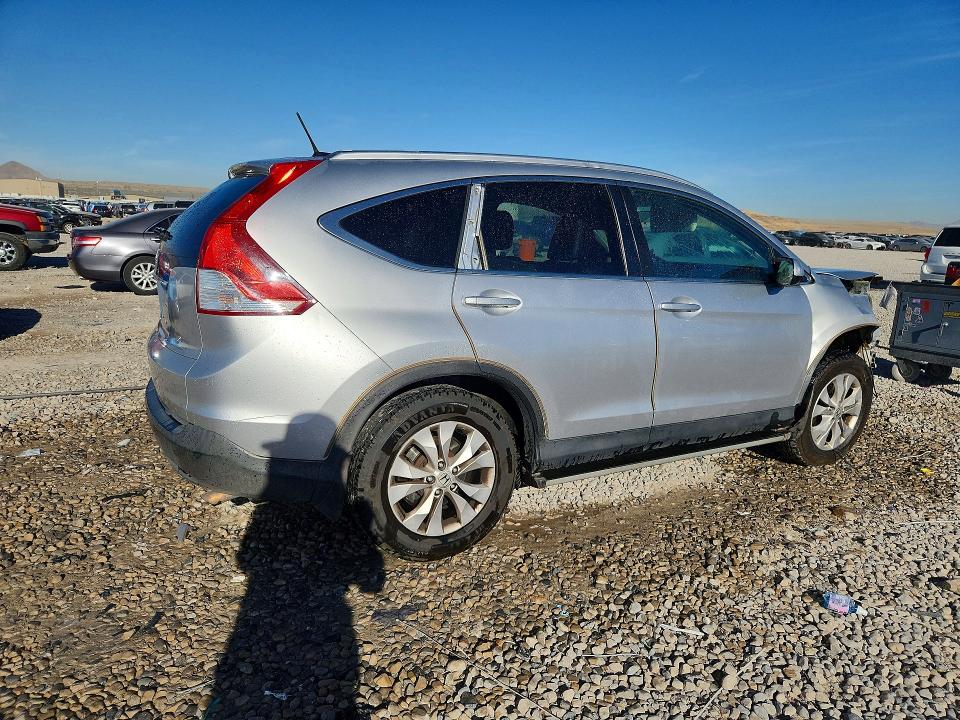 Снимка 3 от търг – 2014 HONDA CR-V с VIN 2HKRM3H70EH533913