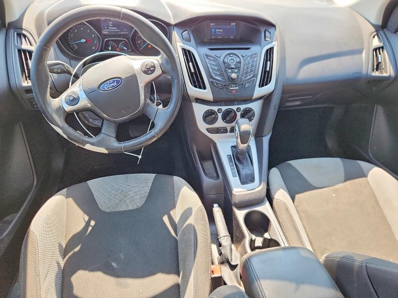 Photo 8 from auction – 2014 FORD FOCUS with VIN 1FADP3F2XEL457918