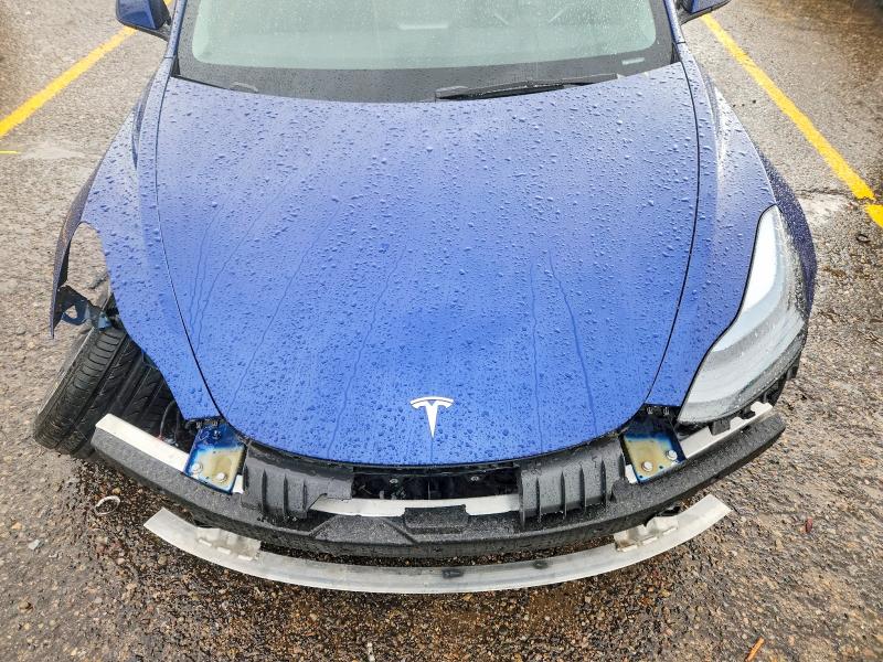 Снимка 11 от търг – 2023 TESLA MODEL 3 с VIN 5YJ3E1EC3PF552143