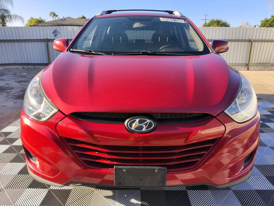 Photo 5 from auction – 2011 HYUNDAI TUCSON with VIN KM8JU3AC6BU212024