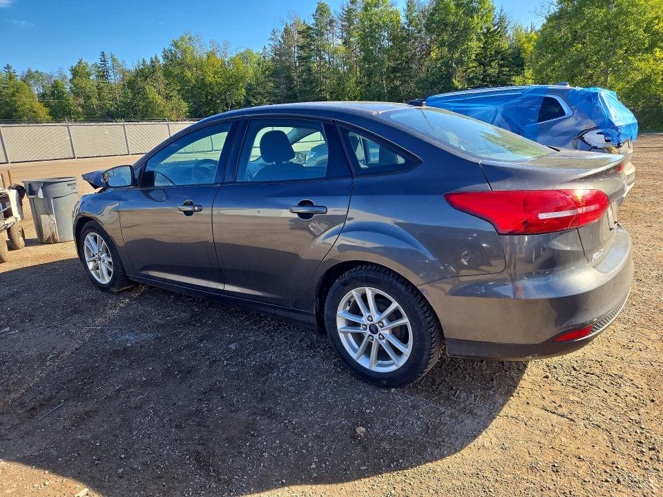 Снимка 2 от търг – 2015 FORD FOCUS с VIN 1FADP3F28FL265432