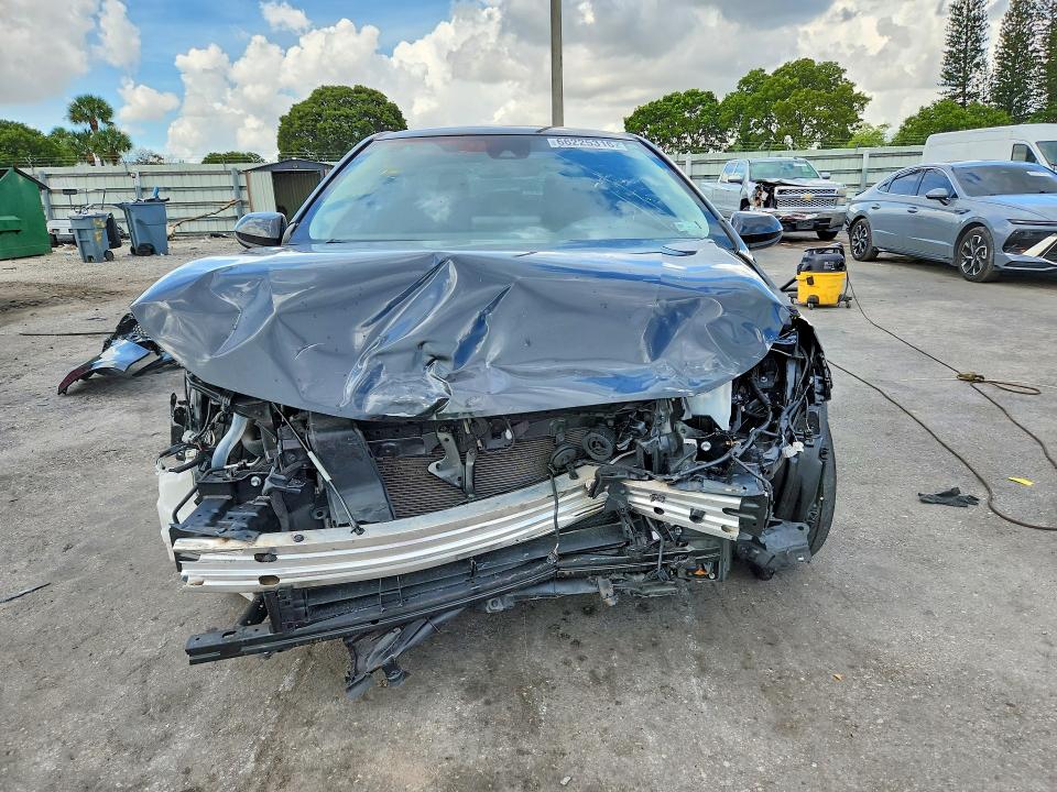 Foto 5 de la subasta – 2022 TOYOTA COROLLA con VIN JTDEAMDE8NJ057483