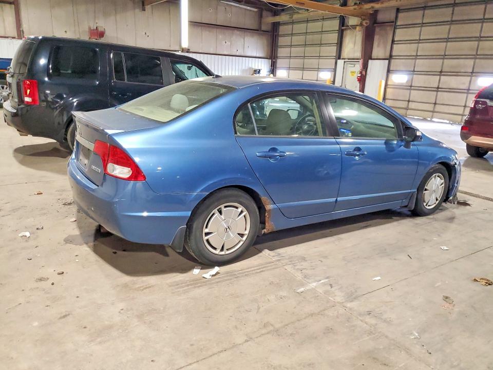 Photo 3 from auction – 2010 HONDA CIVIC with VIN JHMFA3F22AS001589