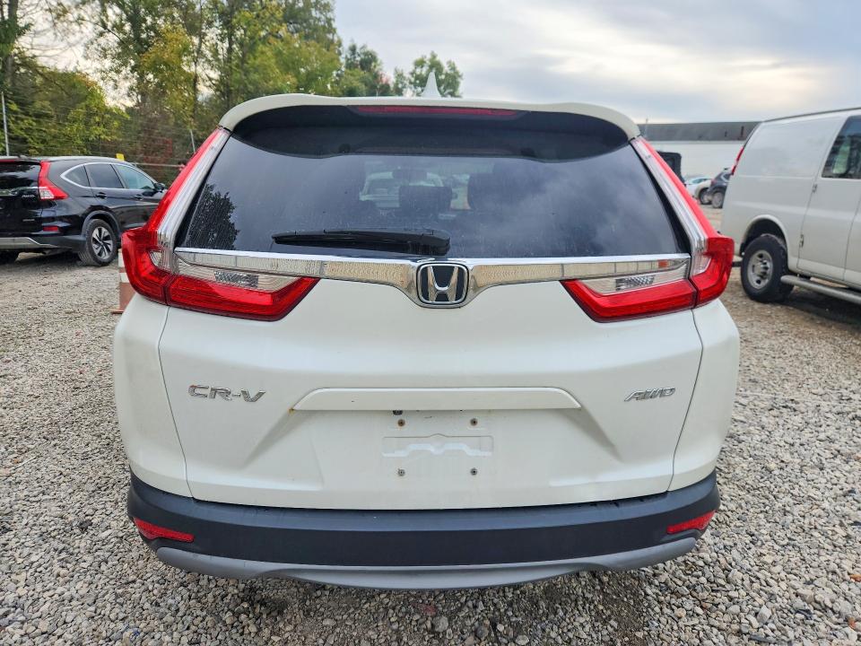 Photo 6 from auction – 2018 HONDA CR-V with VIN 2HKRW2H52JH682613