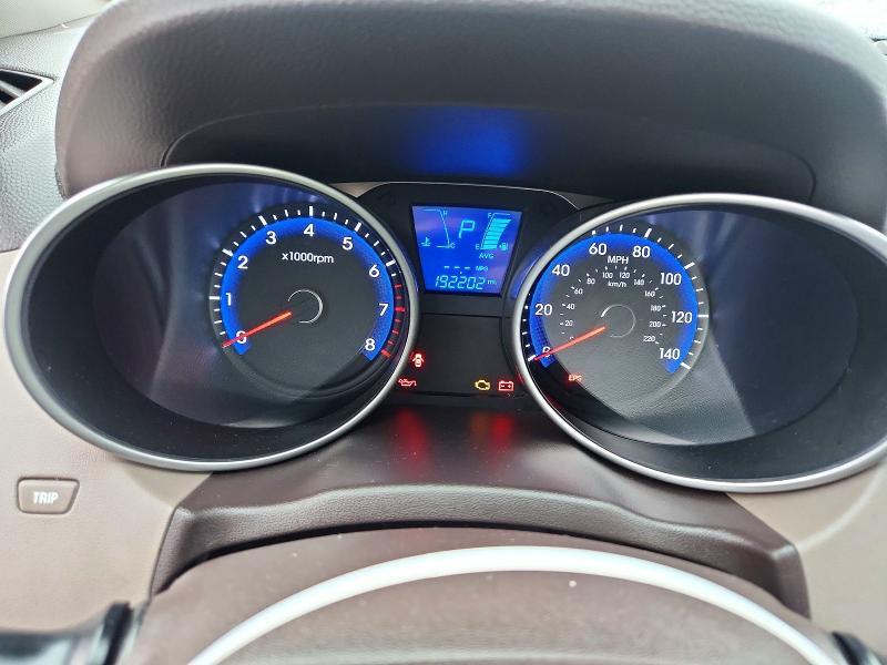 Photo 9 from auction – 2010 HYUNDAI TUCSON with VIN KM8JUCAC3AU023040