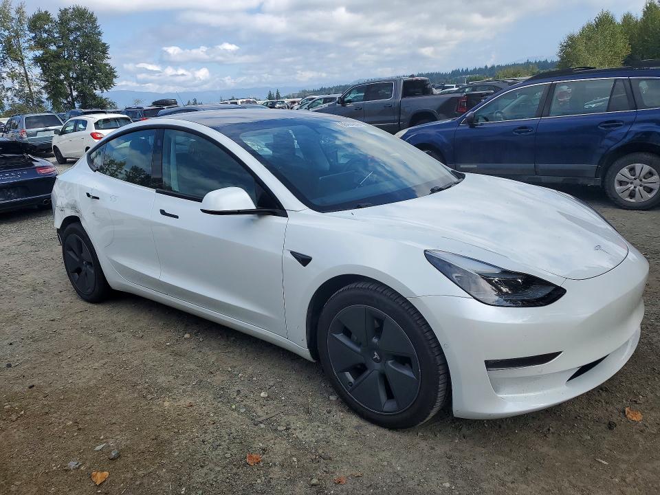Photo 4 from auction – 2021 TESLA MODEL 3 with VIN 5YJ3E1EB5MF044095