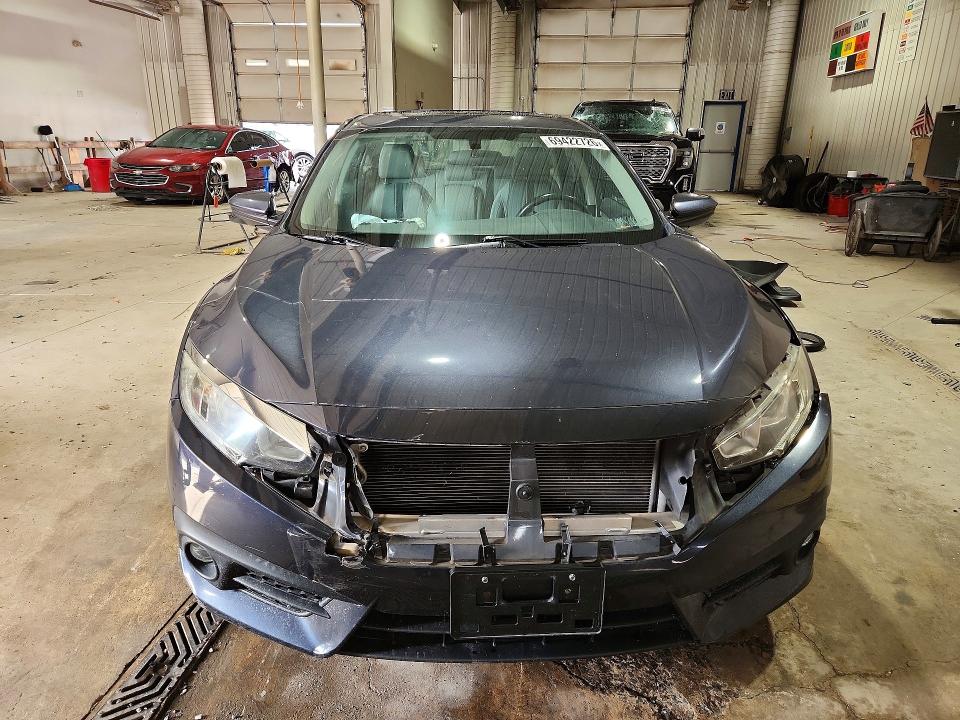 Photo 5 from auction – 2018 HONDA CIVIC with VIN 2HGFC1F35JH640390