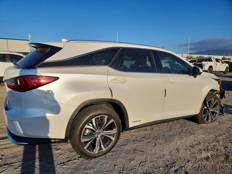 Photo 3 from auction – 2021 LEXUS RX with VIN JTJHGKFA9M2021155