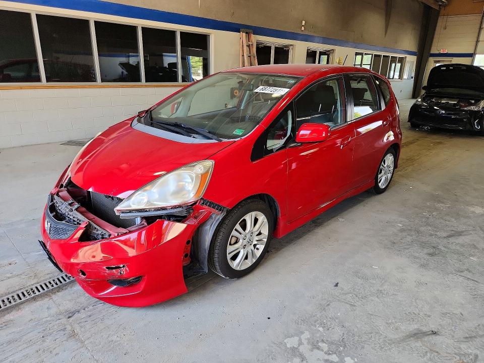HONDA FIT 2009 with VIN JHMGE884X9S021038 - Photo from auction
