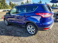 Photo 2 from auction – 2014 FORD ESCAPE with VIN 1FMCU9JX8EUD47668