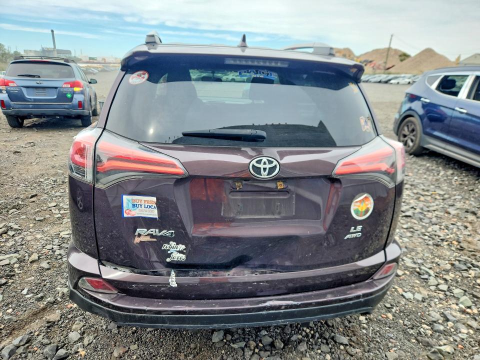 Photo 6 from auction – 2016 TOYOTA RAV4 with VIN 2T3BFREV0GW504599