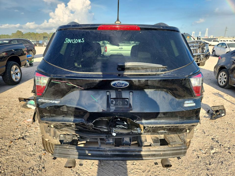 Photo 6 from auction – 2018 FORD ESCAPE with VIN 1FMCU0HD0JUA84755